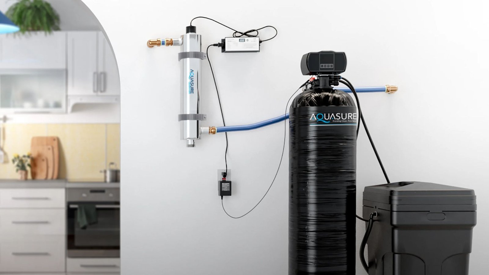 Aquasure water softener integrated system showcasing filtration cylinders, softener tank, and brine tank in a modern kitchen.