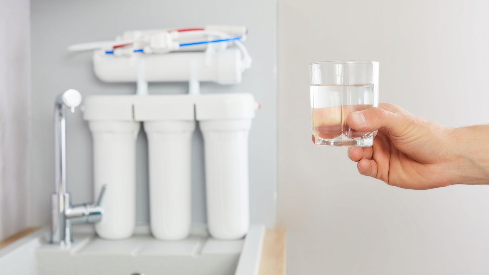 Reverse osmosis water filter system under-counter installation for purified domestic drinking water.