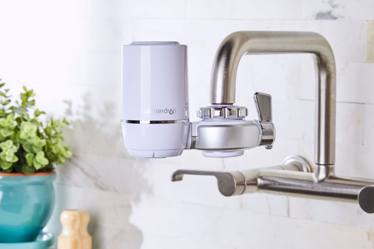 Waterdrop Faucet Filter sleek design, high curved spout, and integrated filter in modern kitchen setting.