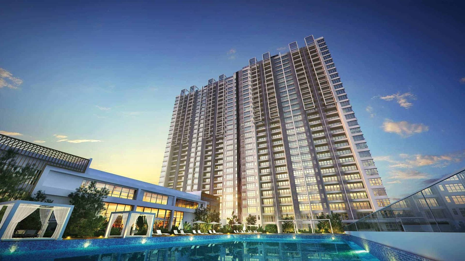 Tankless water heater residential high-rise with pool at twilight, featuring modern architecture and serene ambiance.