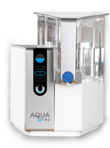 Countertop Reverse Osmosis System AquaTru Classic featuring a sleek design with digital controls and transparent water tanks.