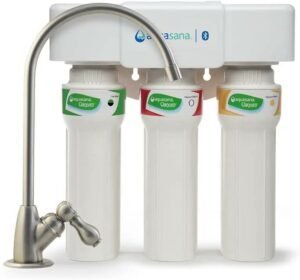 Under-sink water filter Aquasana AQ with stainless steel faucet and three-stage filtration system.