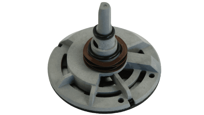Water softener component with cracked rotor valve, featuring a circular design with radial slots.