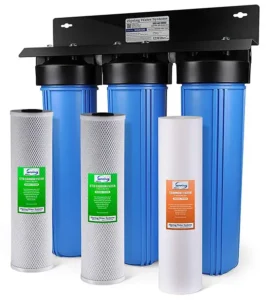 Whole house water filter Ispring system with blue cylindrical filters and varied cartridges for optimal filtration.