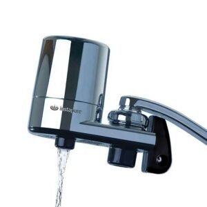 Faucet water filters Instapure F2 with chrome finish attached to kitchen faucet, providing filtered water.