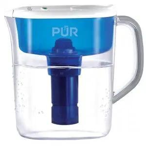 Water filter pitcher PUR Ultimate with sleek design, transparent body, and blue filter mechanism.