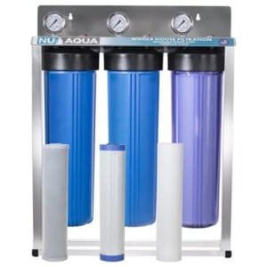 Whole house water filter system with Nuaqua three-stage filtration, pressure gauges, and visible cartridges.